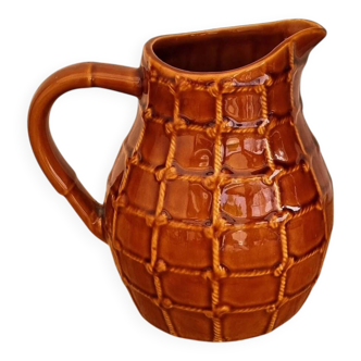 Vintage Saint Clément jug with a caramel checkered design.