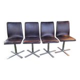 Set of 4 metal and imitation leather swivel chairs.