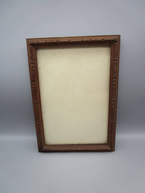 Old frame in worked wood