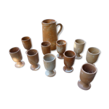 Service mazagrans and decanter in enamelled stoneware.