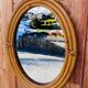 Vintage oval rattan mirror