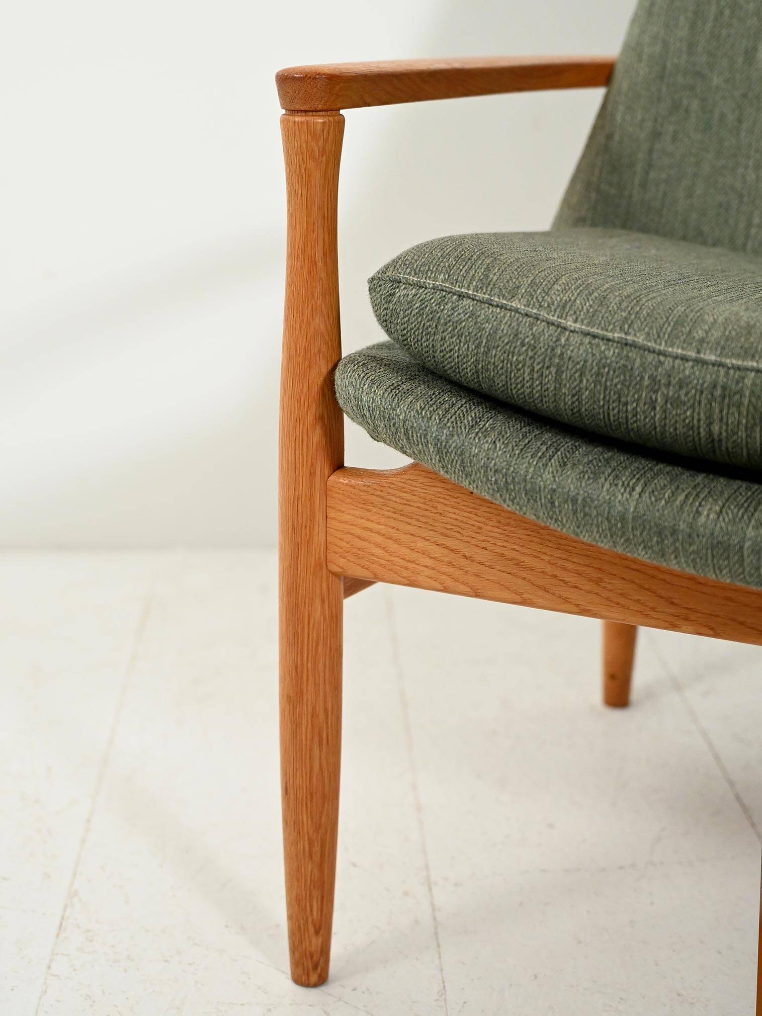 Scandinavian oak and sage-green wool armchair