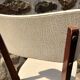 Pair of vintage chairs with upholstered backrest and seat, 1950s style.