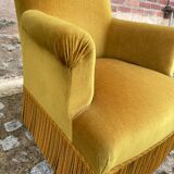 Fauteuil crapaud velours jaune moutarde à franges