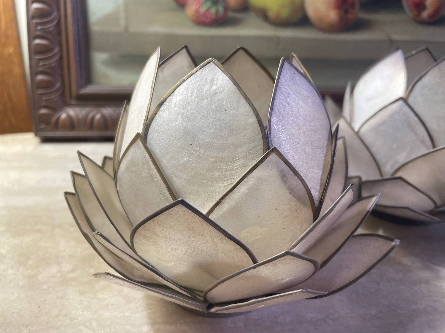 Mother-of-pearl and brass candlesticks