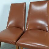 8 brown skai chairs 1950