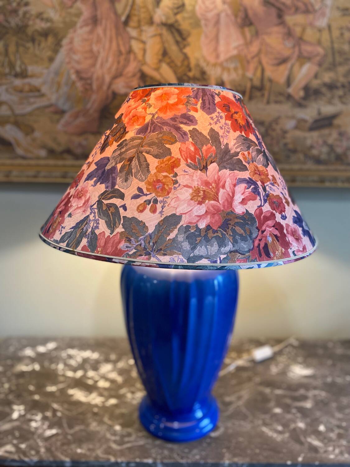 Large blue ceramic lamp with floral shade