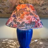 Large blue ceramic lamp with floral shade