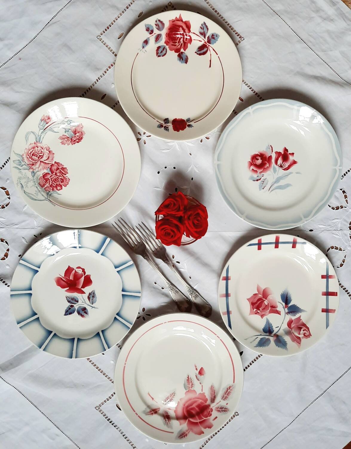 Old mismatched earthenware dinner plates