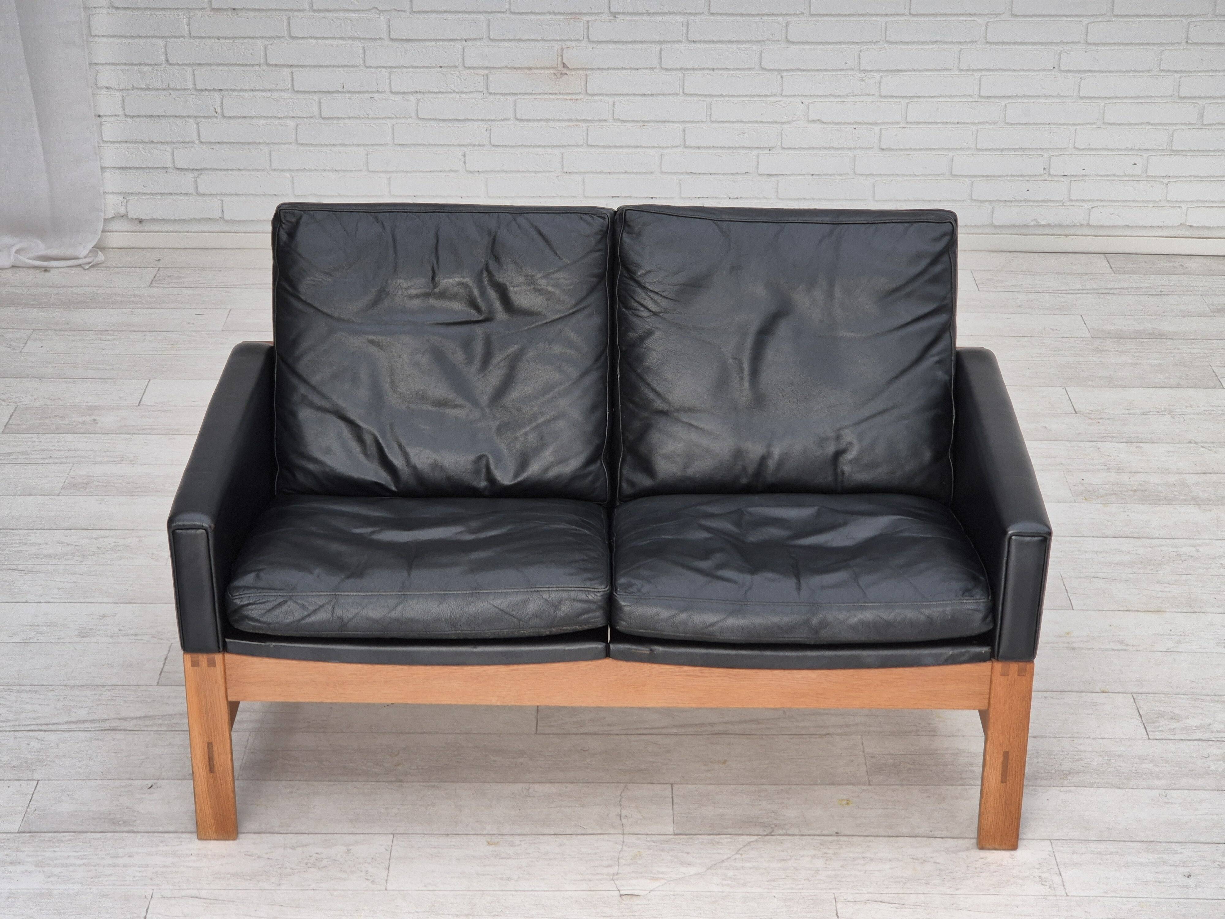 1960s, Danish 2-seater sofa in original condition, furniture leather, solid oak wood.