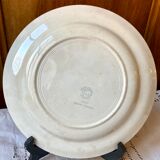 Serving dish round earth of iron earthenware of Givors