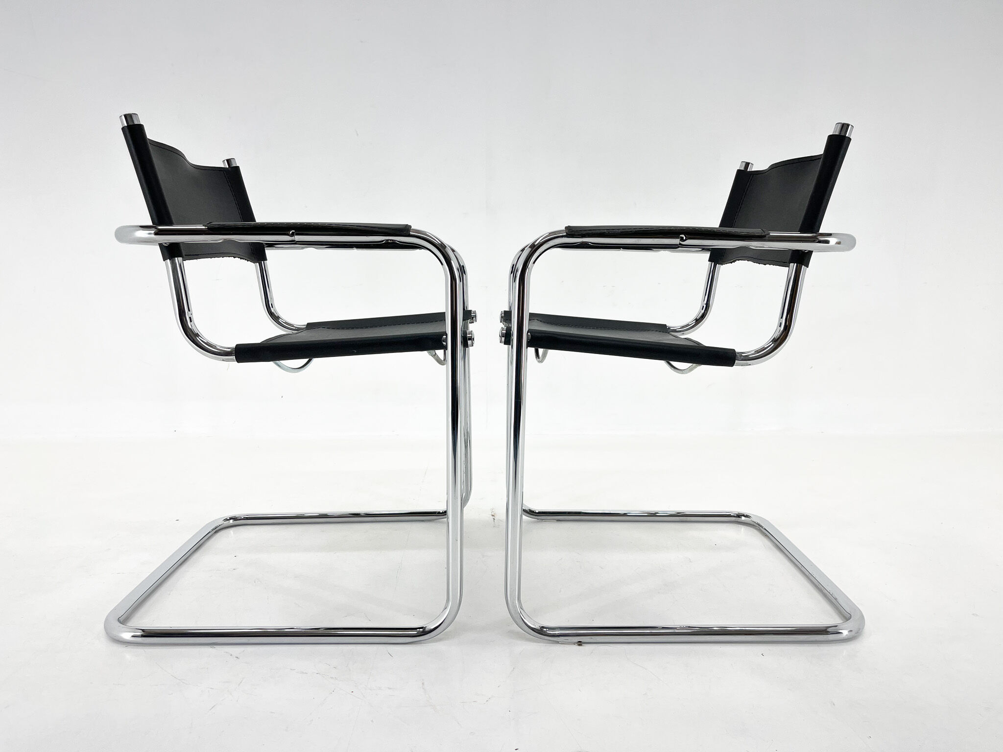 Set of two cantilever chairs, italy