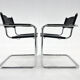 Set of two cantilever chairs, italy