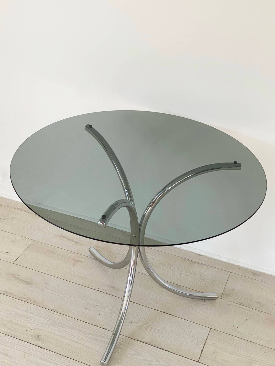 Table for 4 people in smoked glass and metal, 1970.