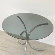 Table for 4 people in smoked glass and metal, 1970.