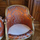 Pair of Louis XVI period shepherdesses, in gilded wood