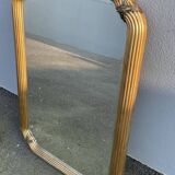 Miroir doré contour ligné