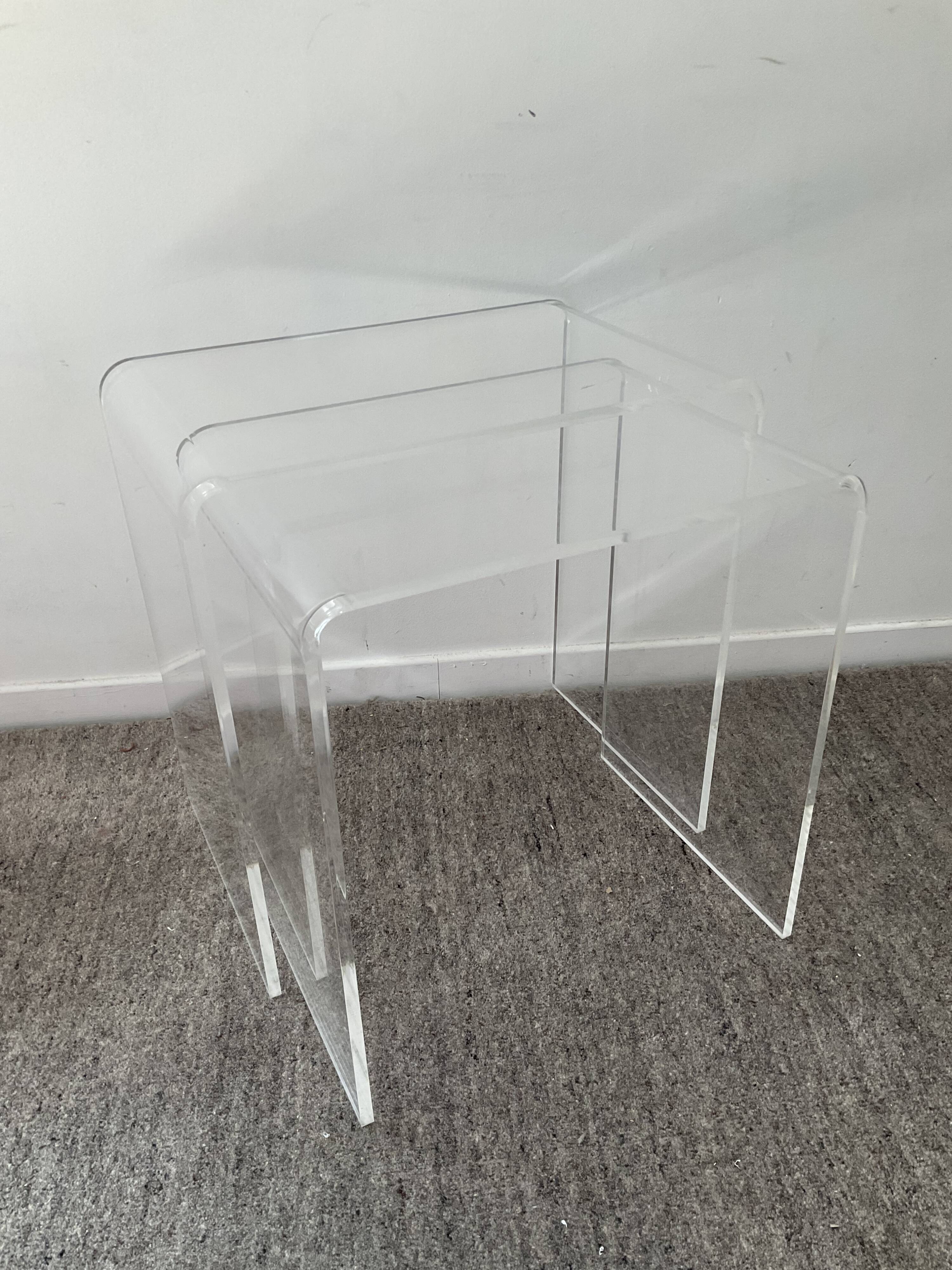 Duo of pull-out tables in plexiglass 70s