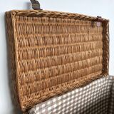 Vintage wicker trunk with burgundy metal closures