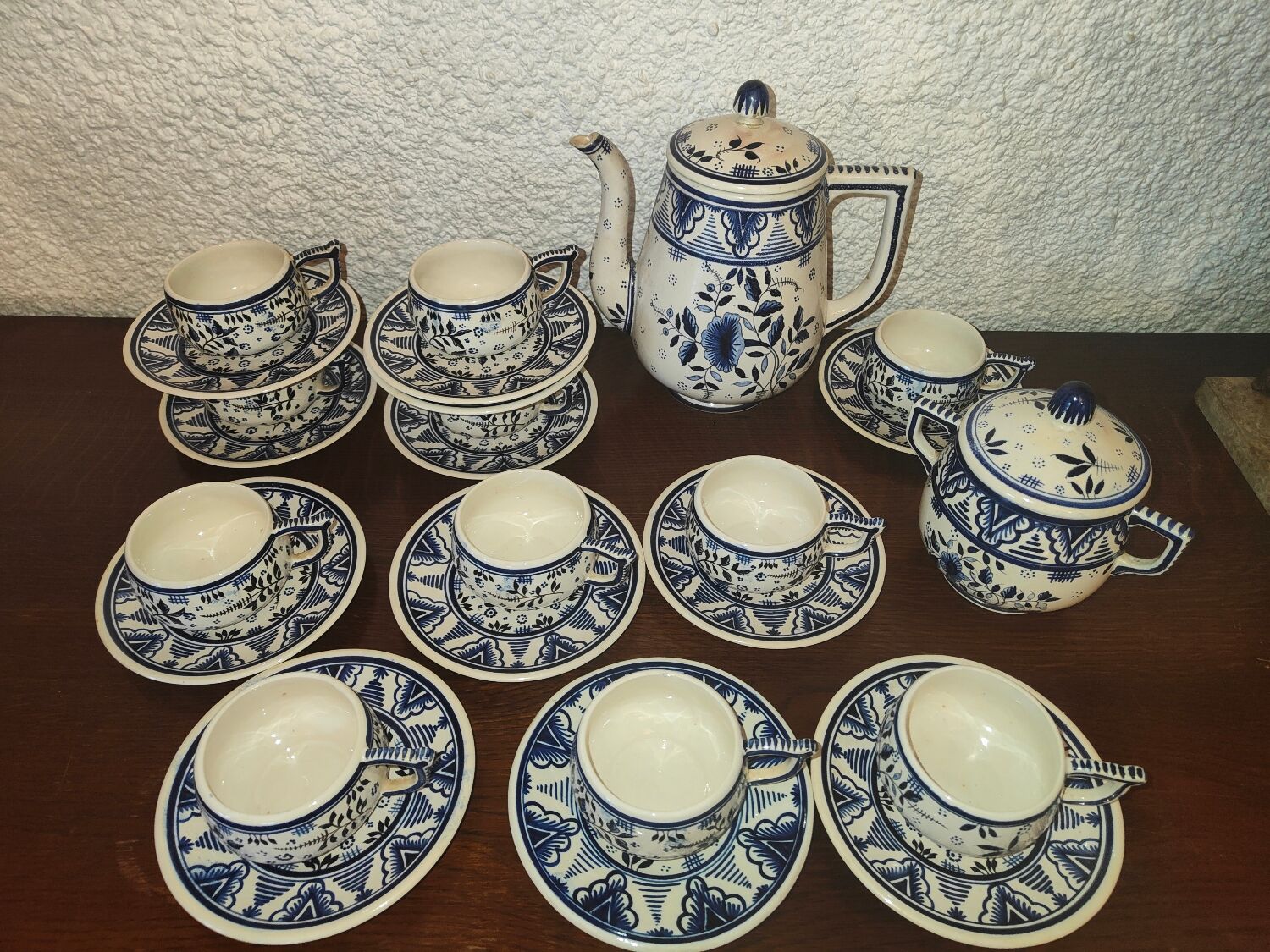 Henriot Quimper earthenware coffee set with floral decoration and elegant blue
