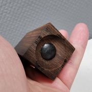 A set of salt and pepper shakers in rosewood