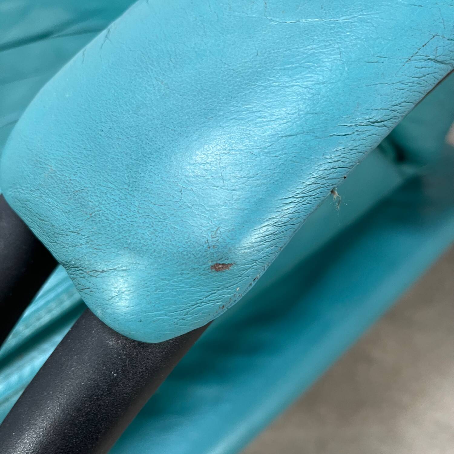 Postmodern design armchair and ottoman, 80s leather