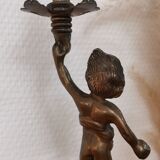 Pair of antique candlesticks in bronze and brass