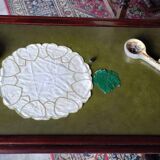 Living room coffee table with green leather and wood top