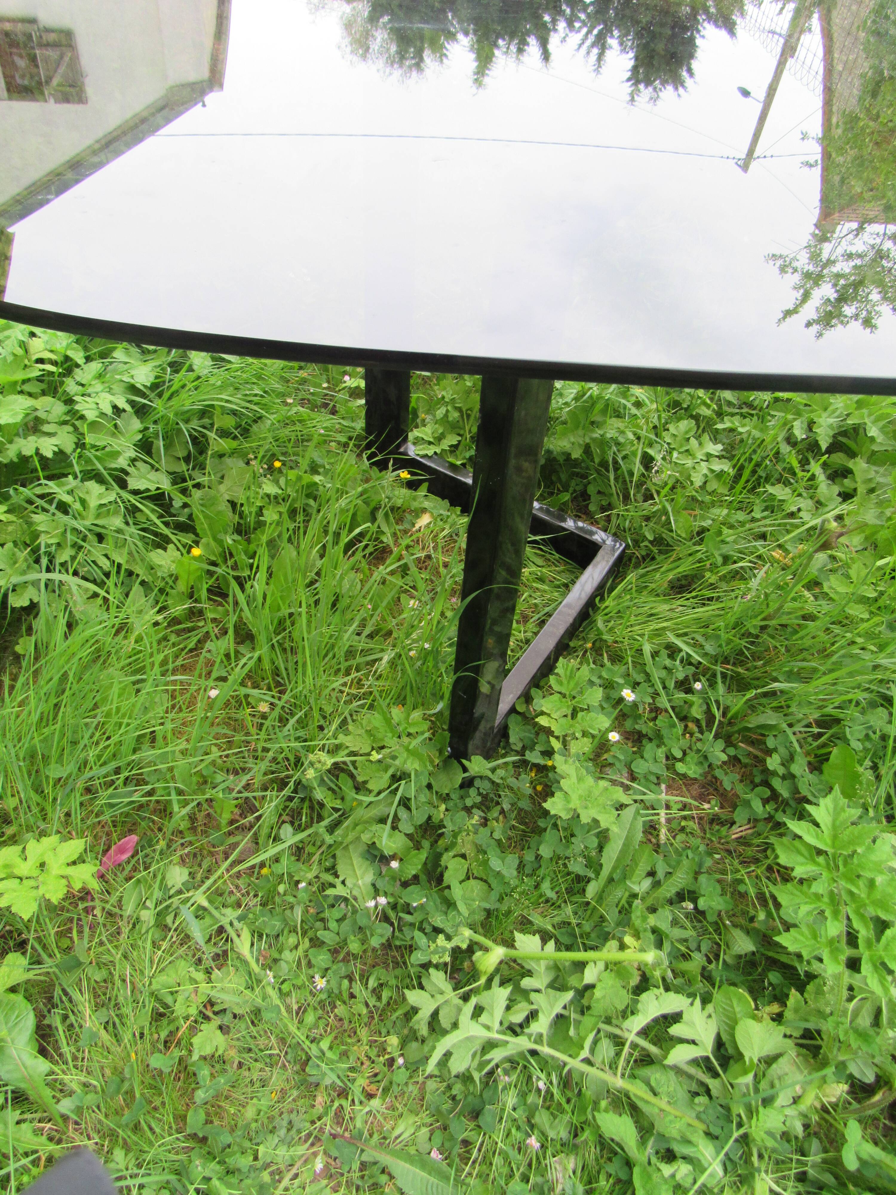 large oval table in smoked glass 80