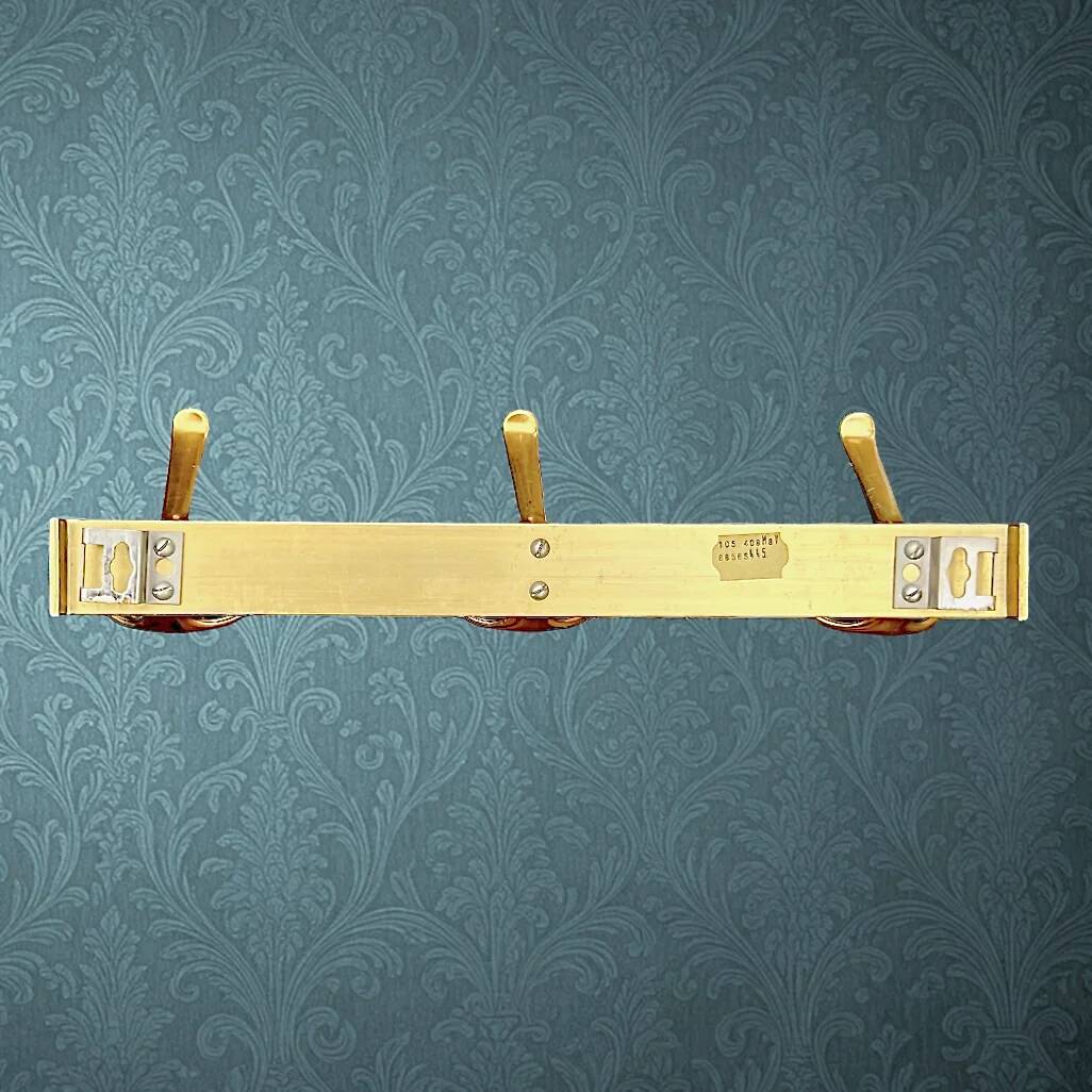 Vintage wall-mounted coat rack in anodised gold aluminium with 3 hooks from the 1970s.