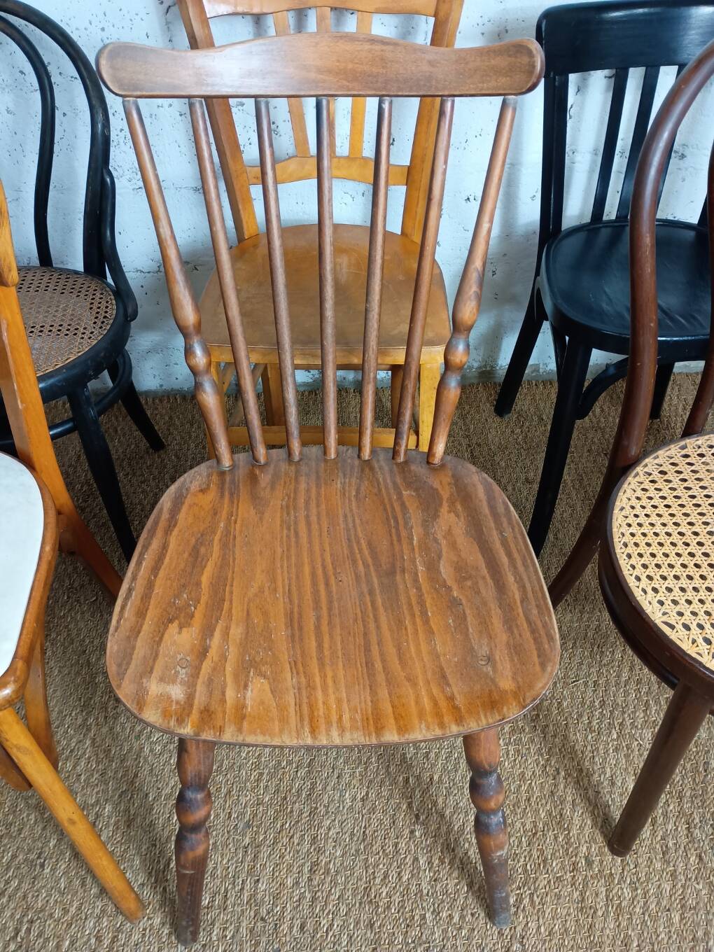 Set of 8 mismatched vintage Baumann Lebrun bistro chairs.