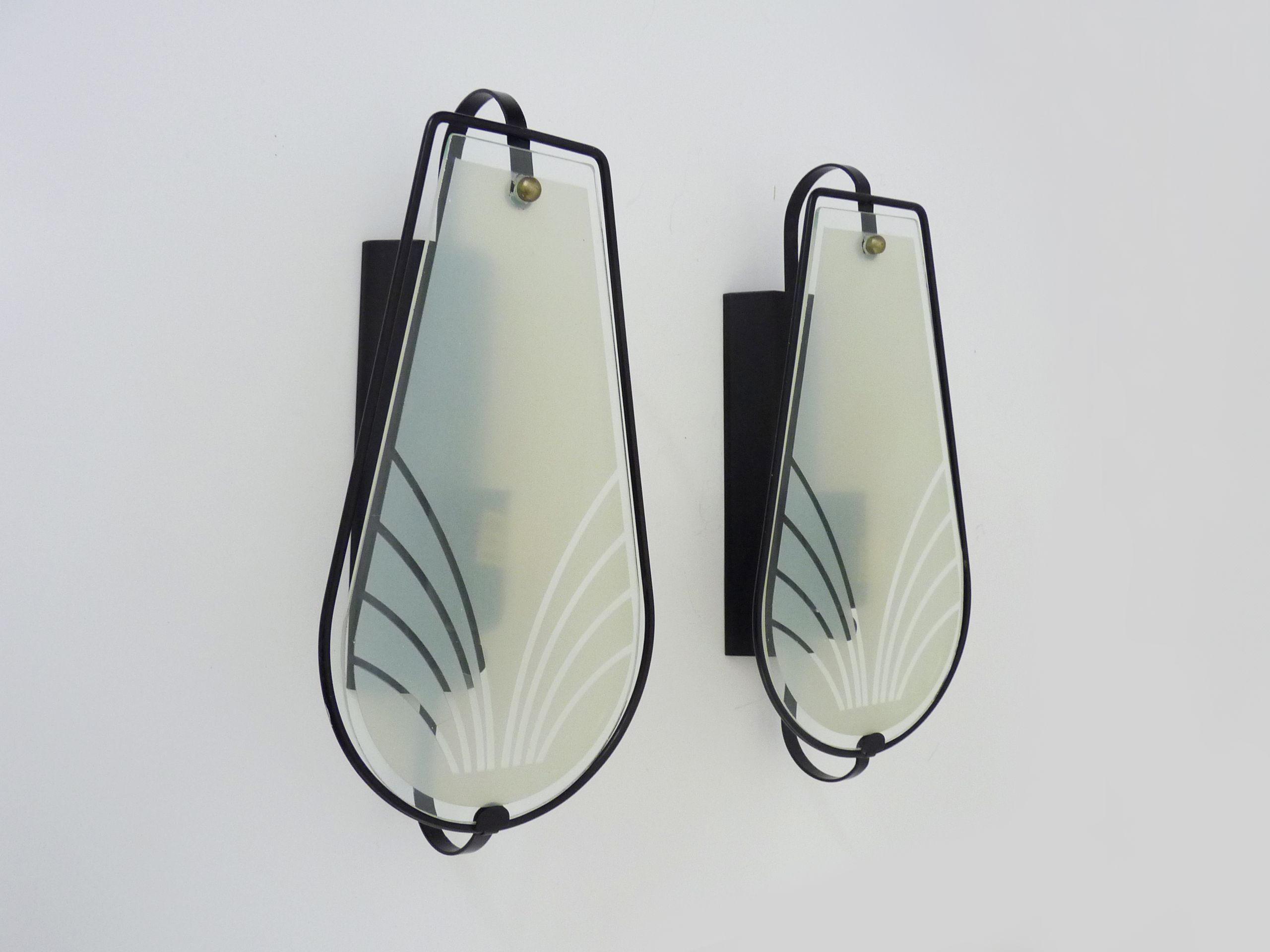 Pair of vintage wall appliques in black metal and blue patterned glass. Year 70