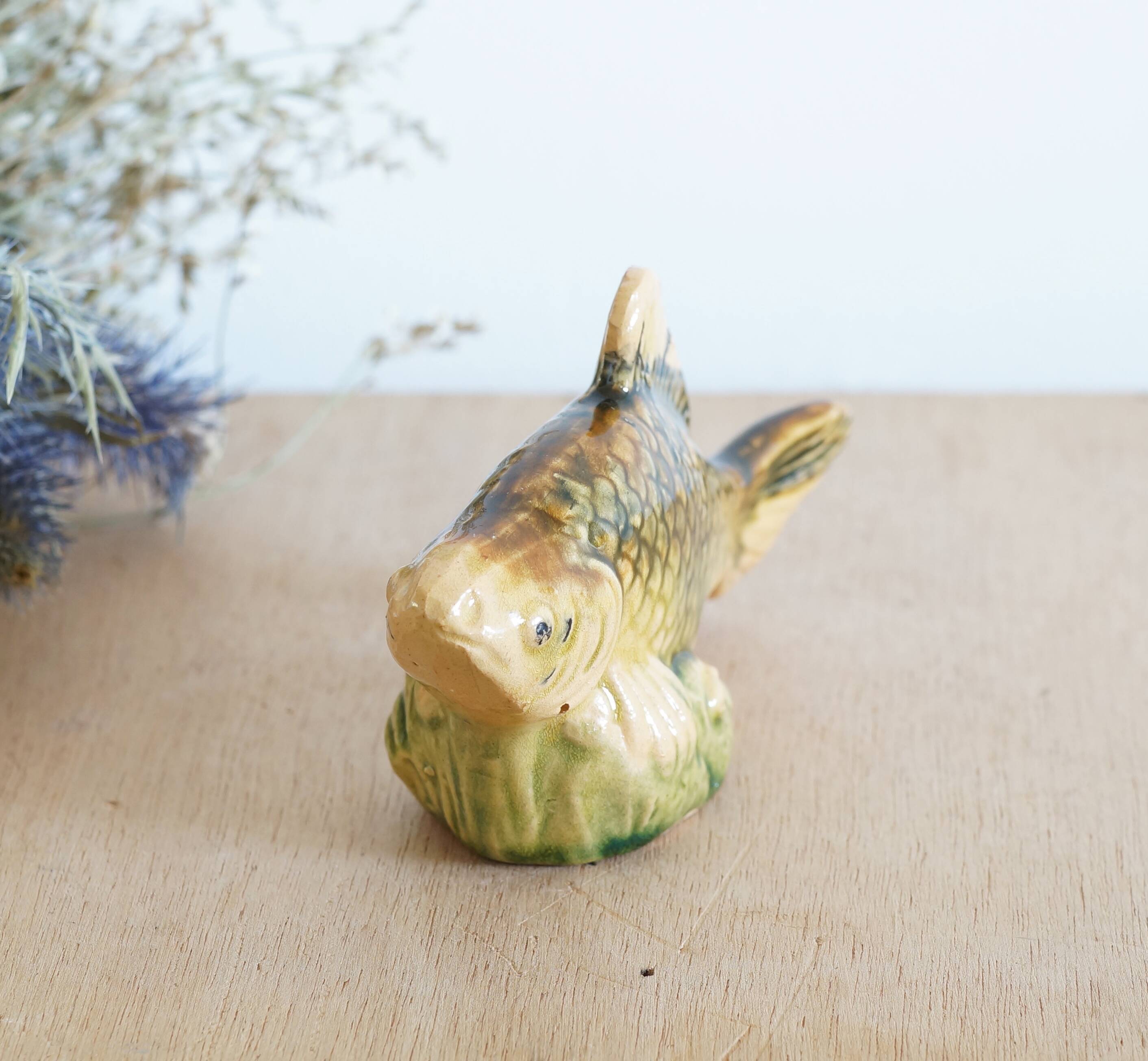 Small earthenware fish figurine