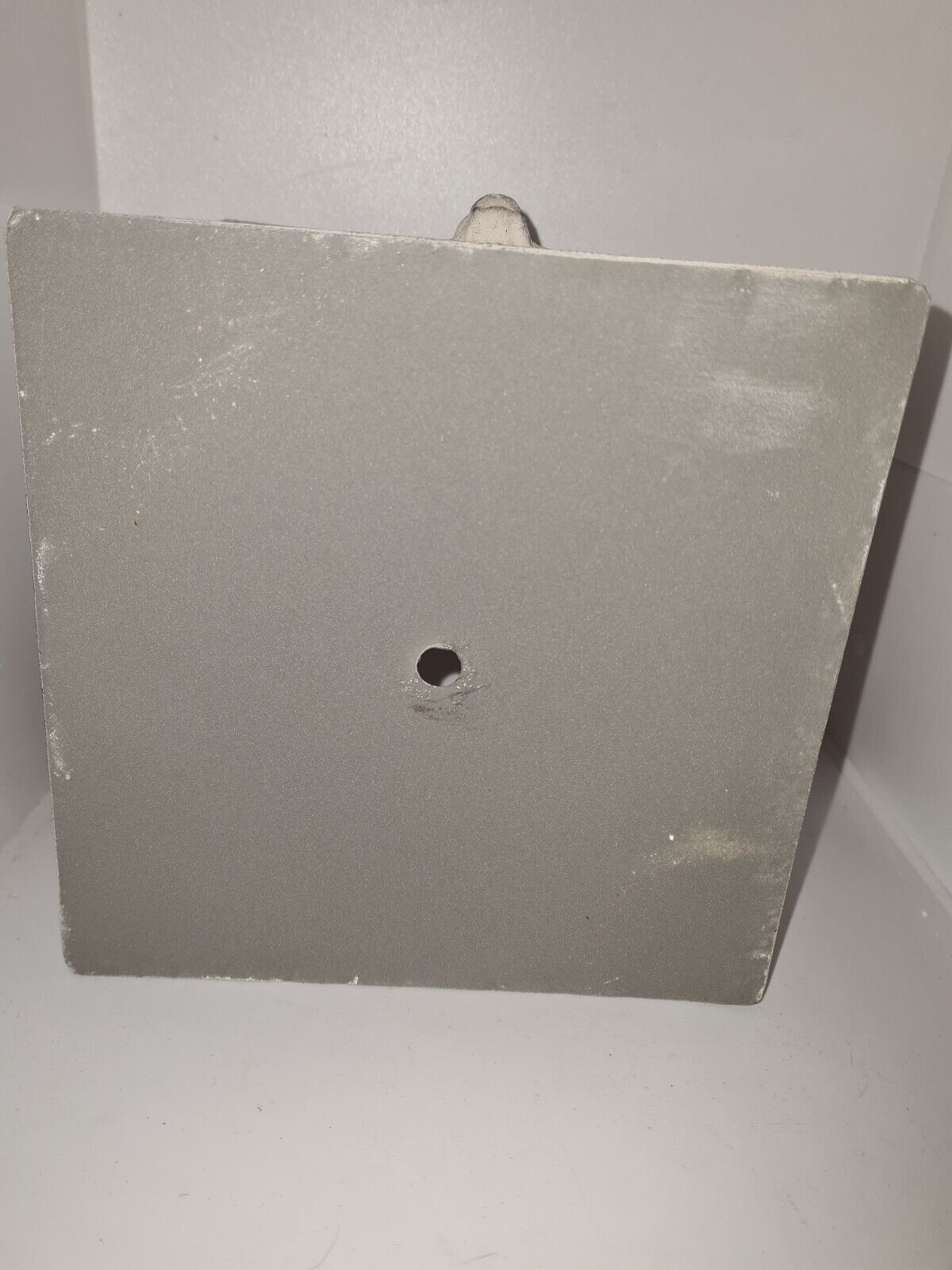 Square planter with patinated iron lion heads