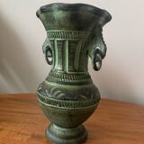 Ancient Greek style ceramic vase with curls