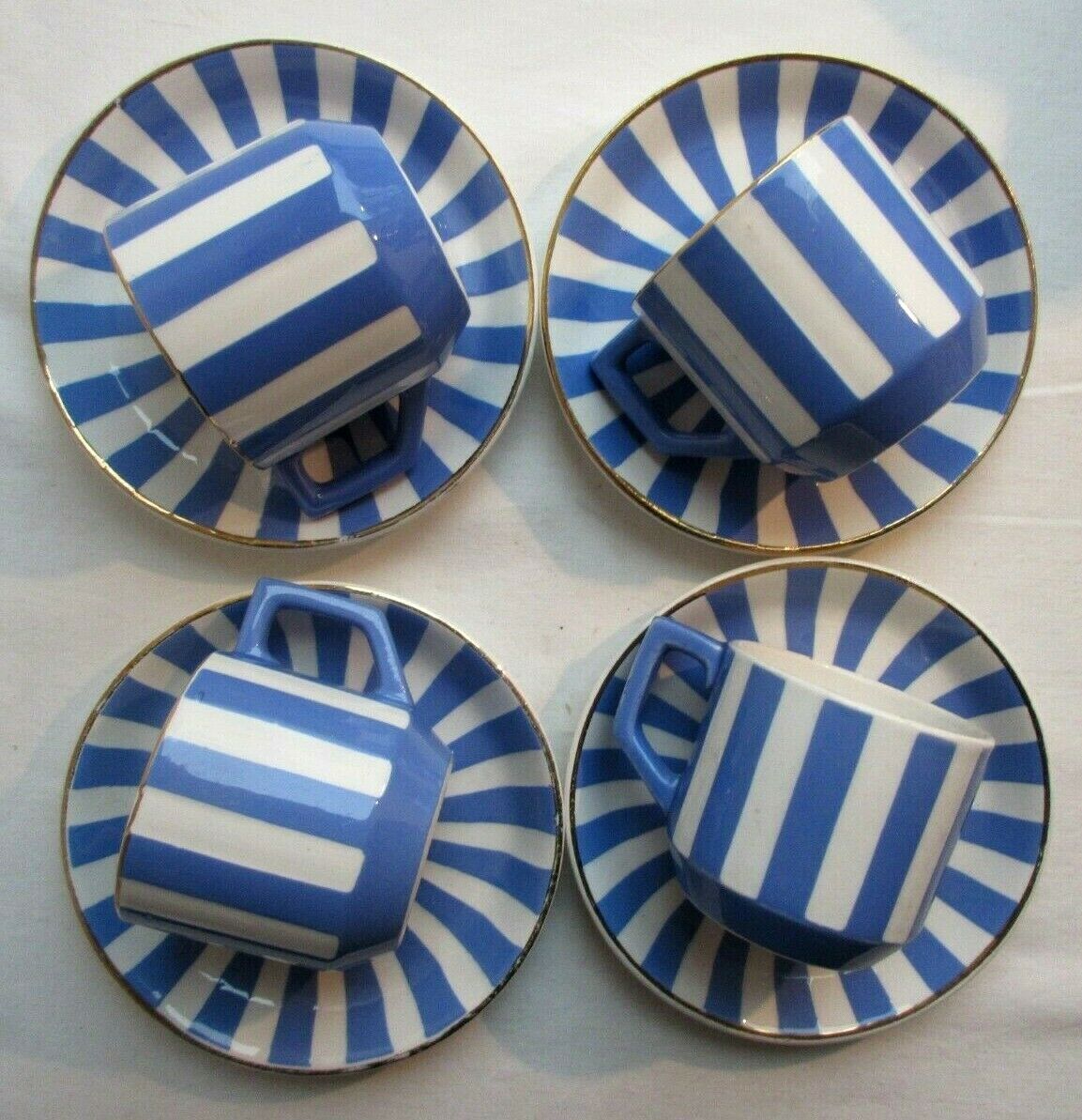 Set of 4 coffee cups and 4 saucers signed Sarreguemines, model FOX TROTT