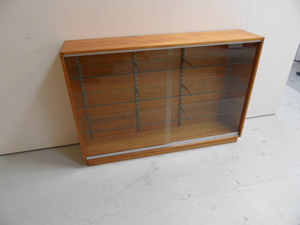 Vintage shop display cabinet with sliding doors