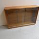 Vintage shop display cabinet with sliding doors
