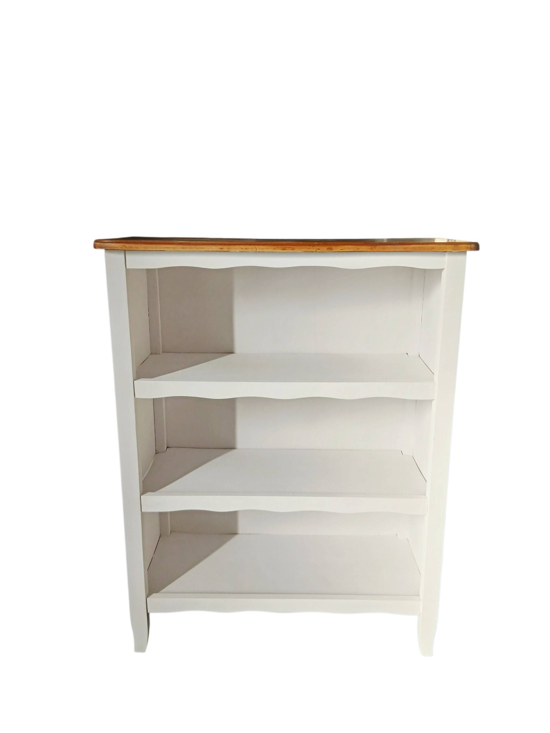 Old white bookshelf and raw wood.