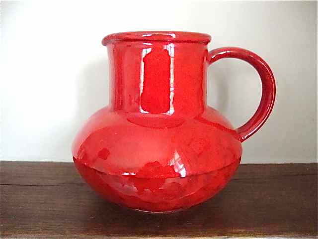 Red ceramic pitcher