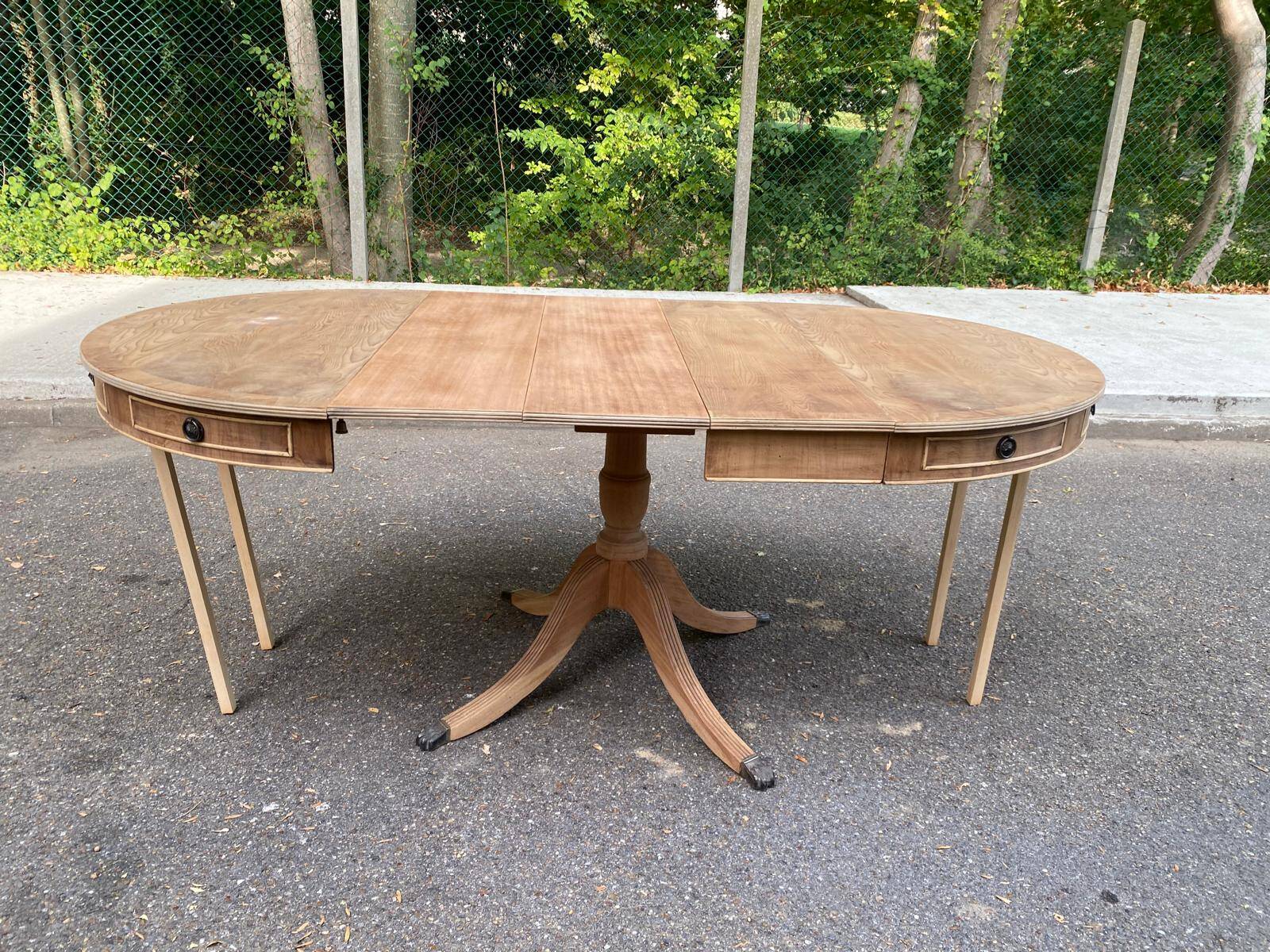 Round extendable dining table Regency central leg stripped mahogany 1960