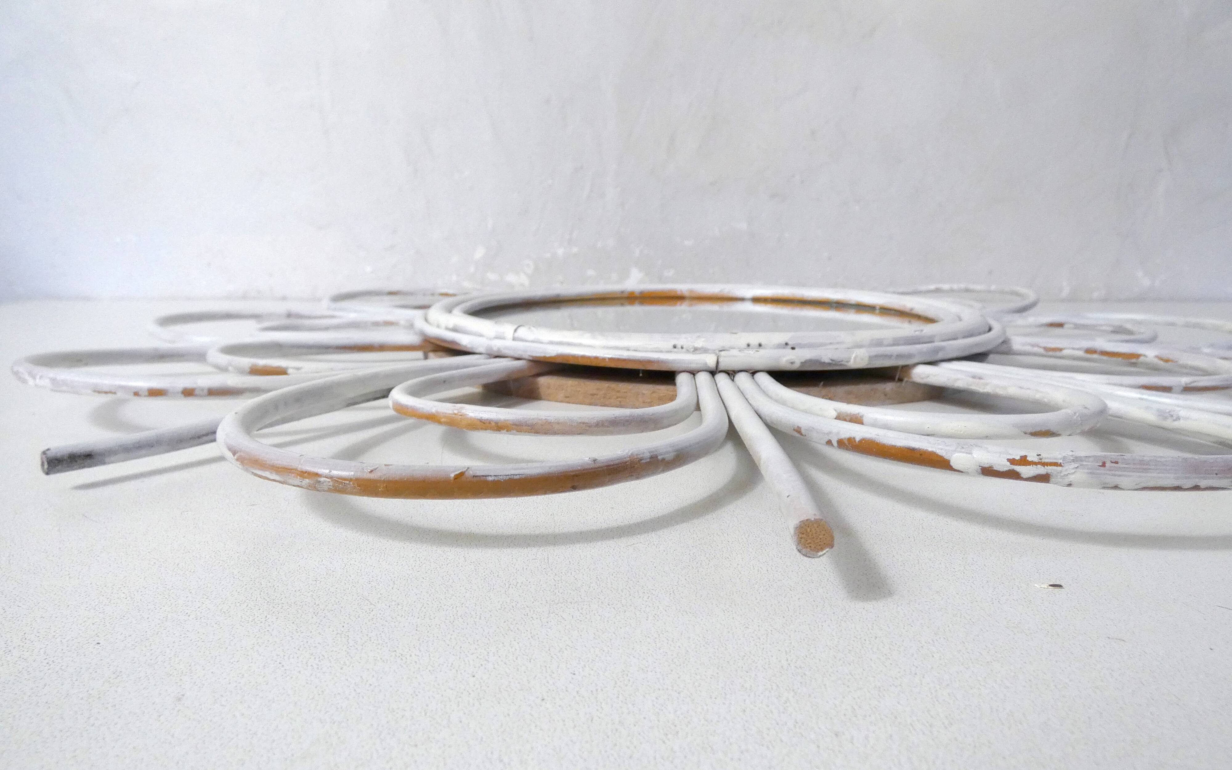 Vintage rattan sun mirror