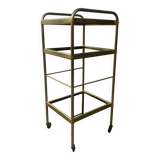 Small rolling trolley in brass and black plastic