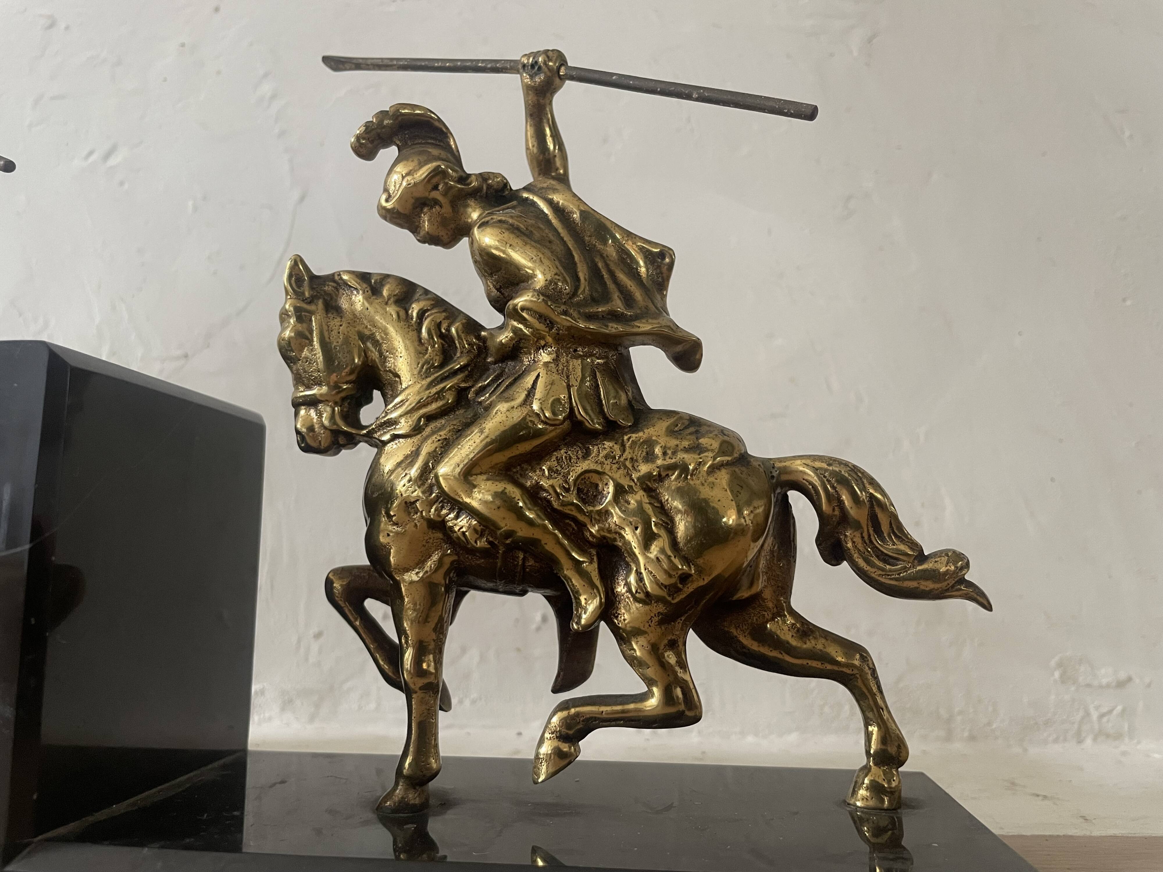 Pair of neo-classical Roman soldier bookends in marble and brass.
