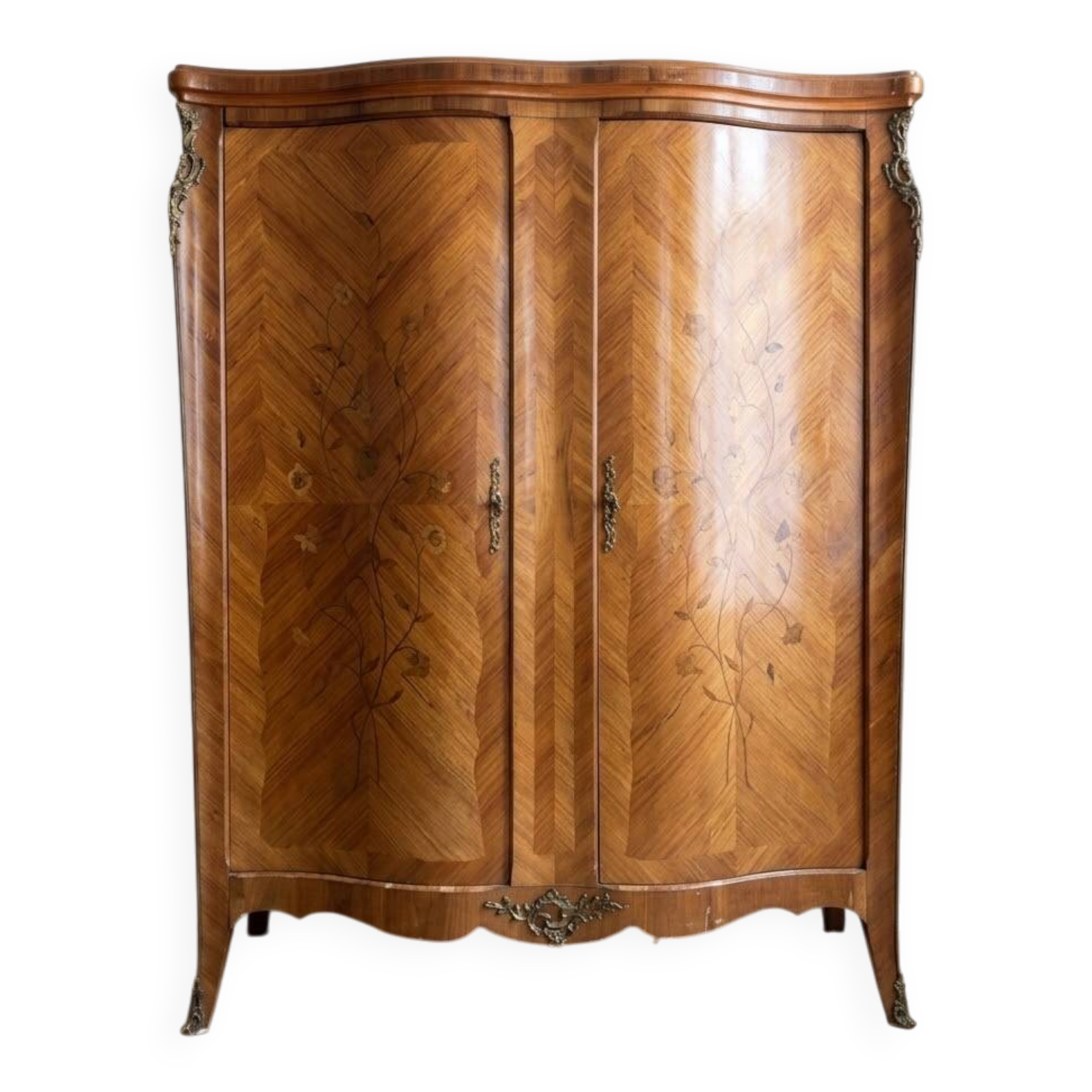 Louis XV wardrobe in floral marquetry and bronze.