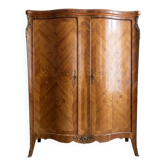 Louis XV wardrobe in floral marquetry and bronze.