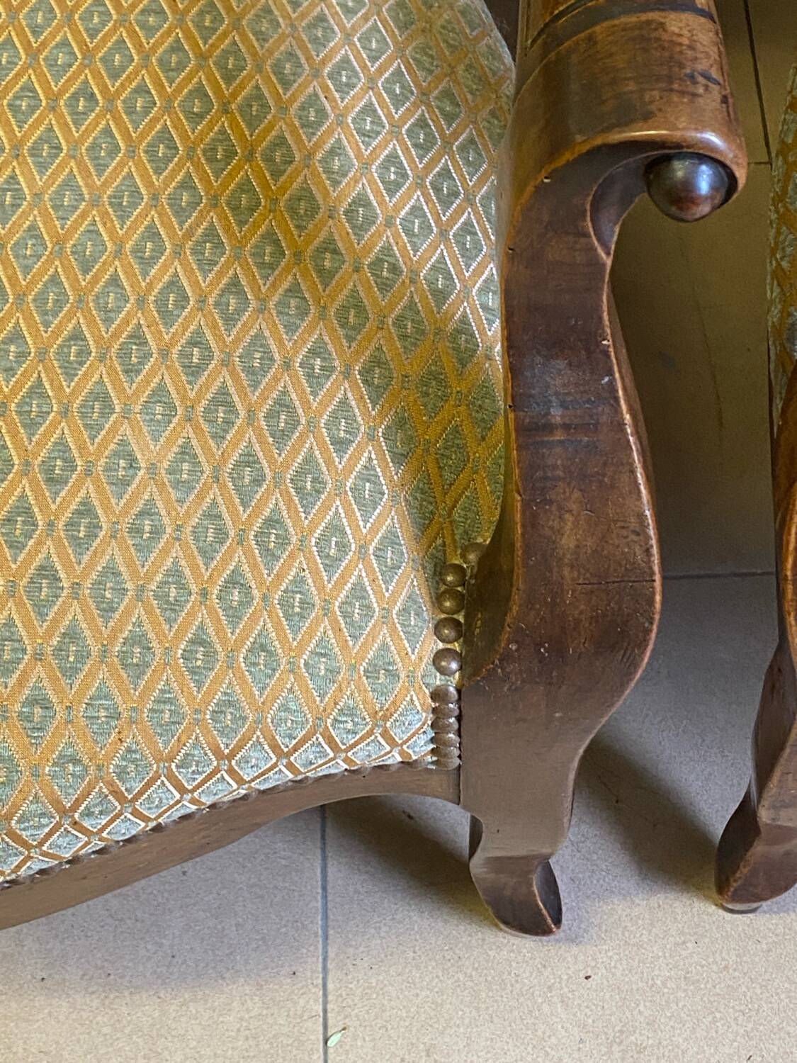 Two Louis XV style wooden and fabric armchairs