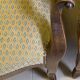 Two Louis XV style wooden and fabric armchairs