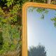 Antique Louis-Philippe mirror, gilded and patinated.