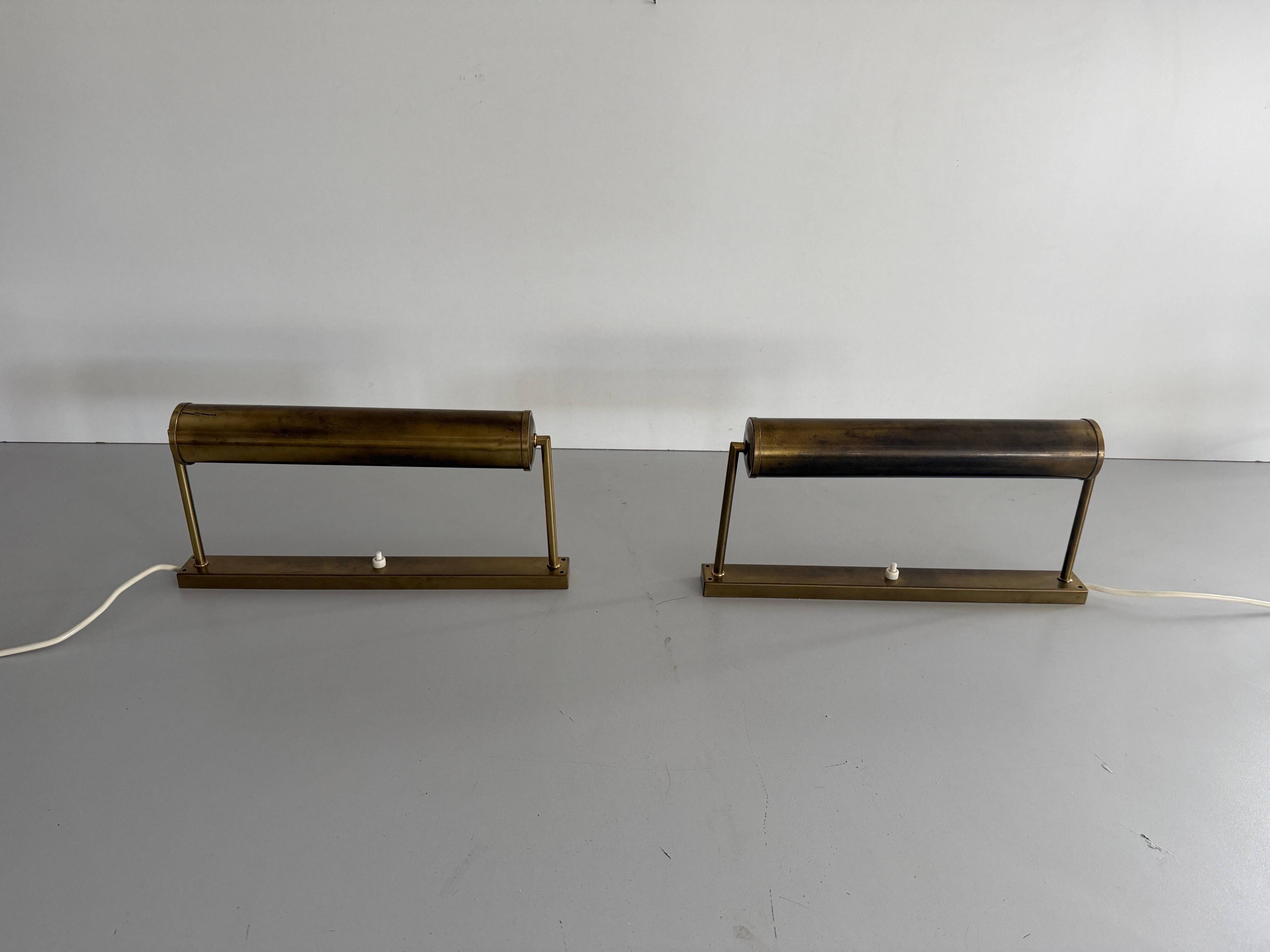 Pair of brass wall lights with adjustable heads from the mid-20th century, 1960, Germany.